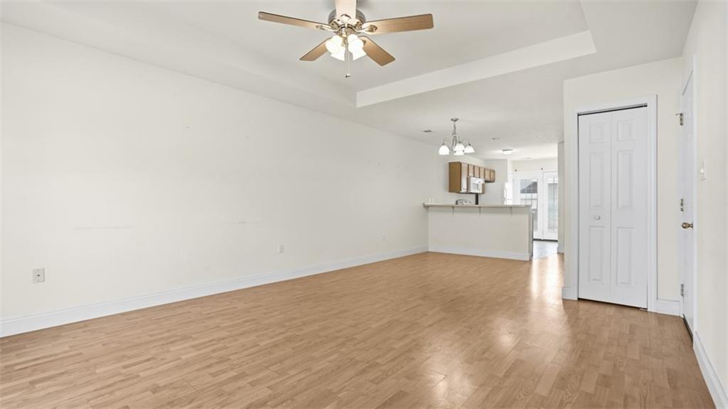 607 Locust Street Coraopolis, PA 15108 - Photo 4 of 18 wooden floor in an empty room with a window