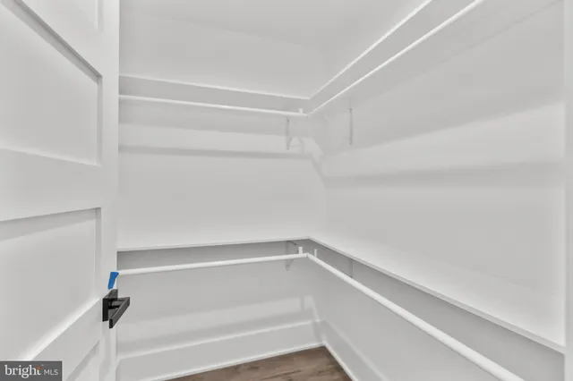 a view of an empty walk in closet