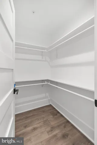 a view of an empty walk in closet