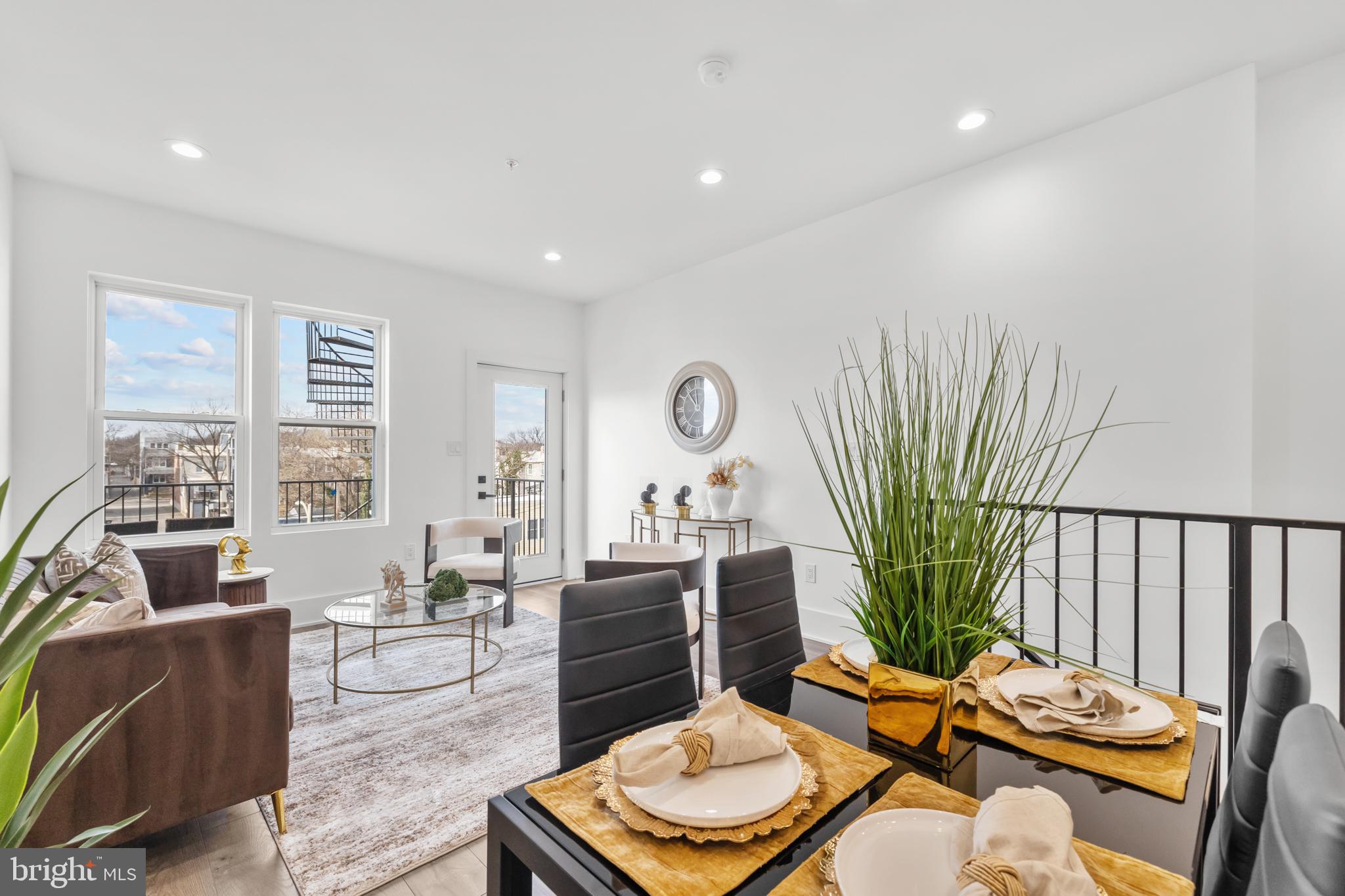 113 18th Street Southeast, Unit 2 Washington, DC 20003 - Photo 2 of 39 a living room with furniture and a wooden floor