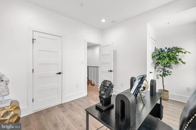 a view of front door with potted plant
