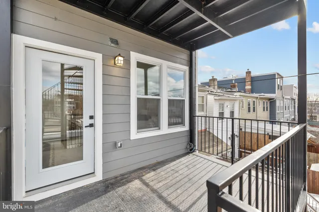 a view of a balcony with city view