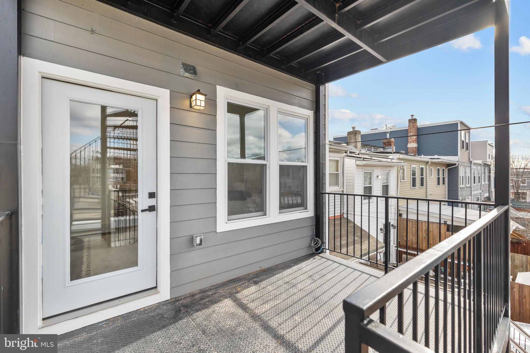 113 18th Street Southeast, Unit 2 Washington, DC 20003 - Photo 31 of 39 a view of a balcony with wooden floor