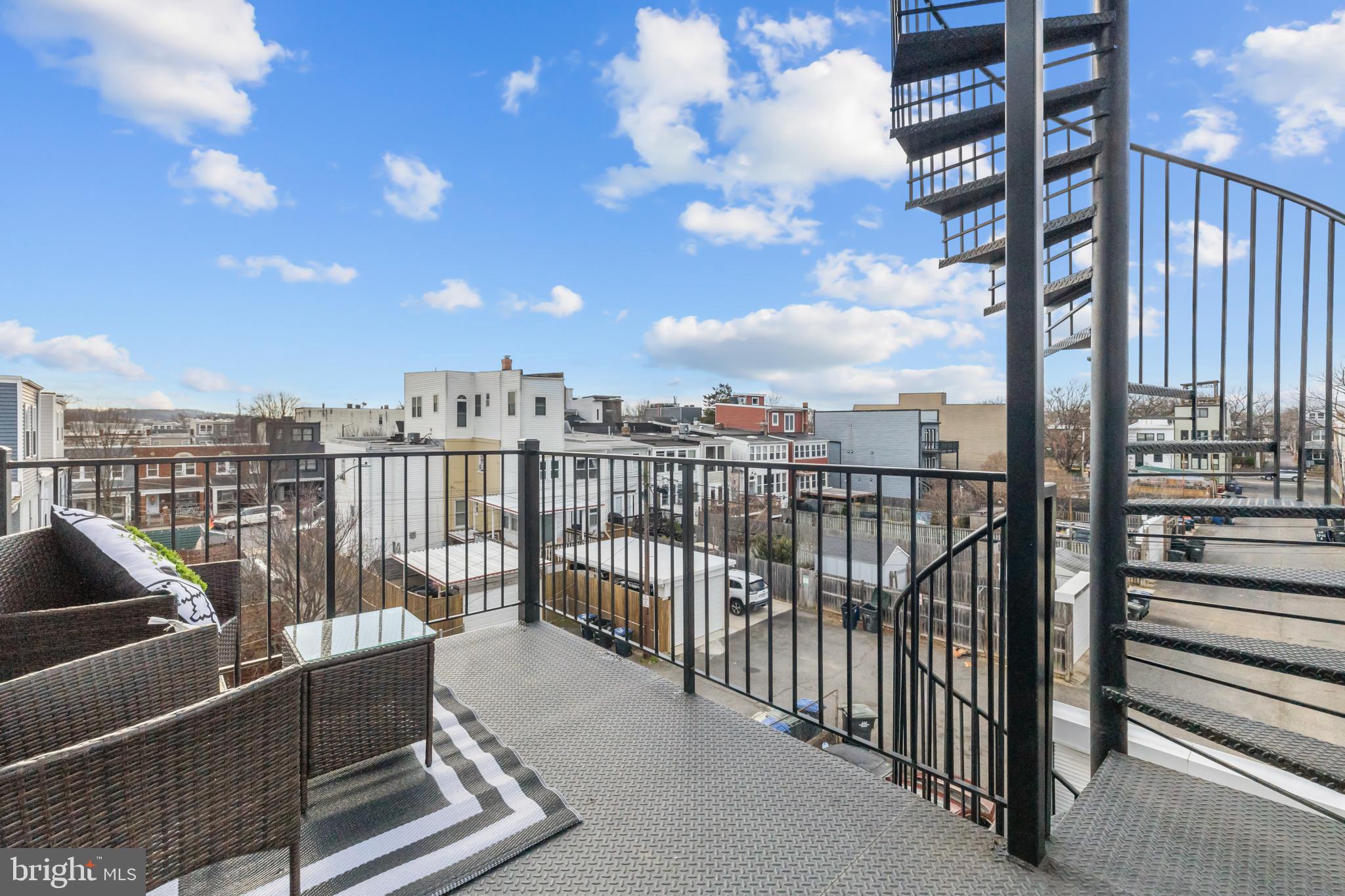 113 18th Street Southeast, Unit 2 Washington, DC 20003 - Photo 32 of 39 a view of a balcony with city view