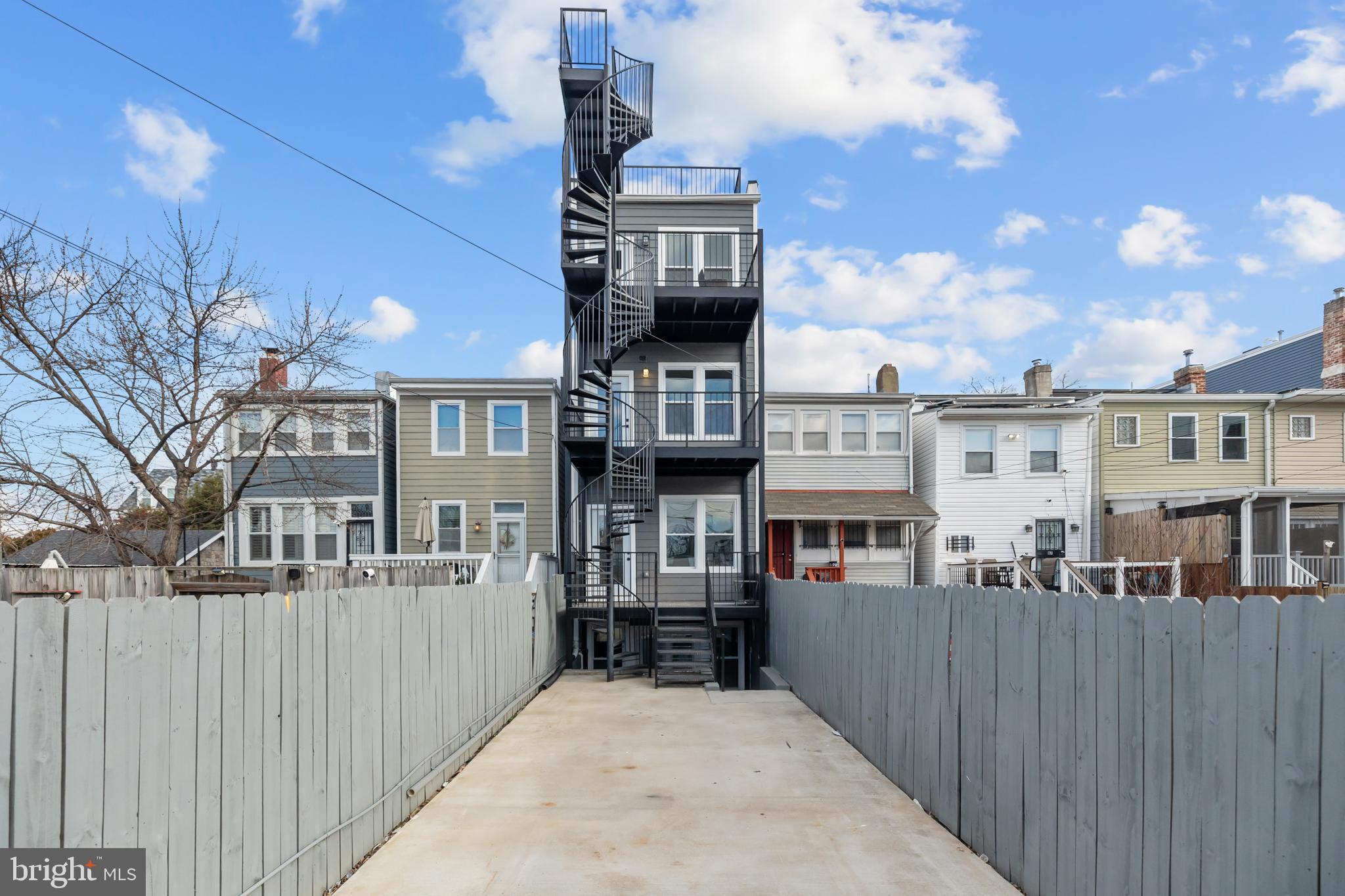 113 18th Street Southeast, Unit 2 Washington, DC 20003 - Photo 38 of 39 a front view of a house with large windows