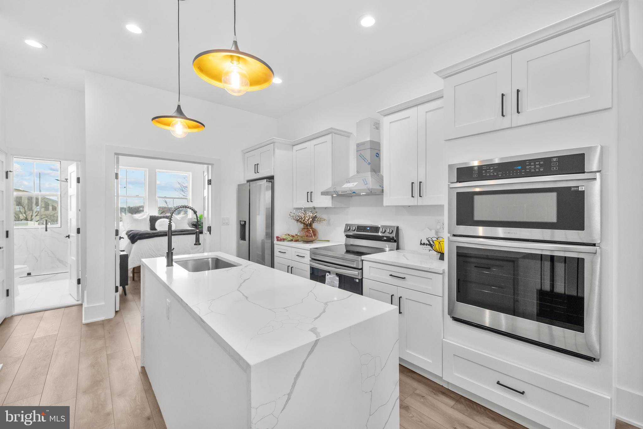 113 18th Street Southeast, Unit 2 Washington, DC 20003 - Photo 8 of 39 a kitchen with cabinets and steel stainless steel appliances