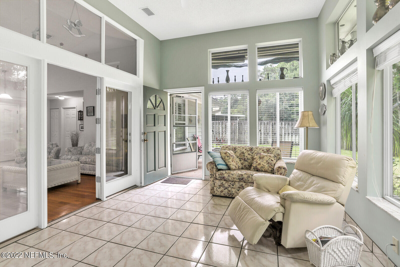 1520 Marsh Rabbit Way Fleming Island, FL 32003 - Photo 19 of 32 Sun Room