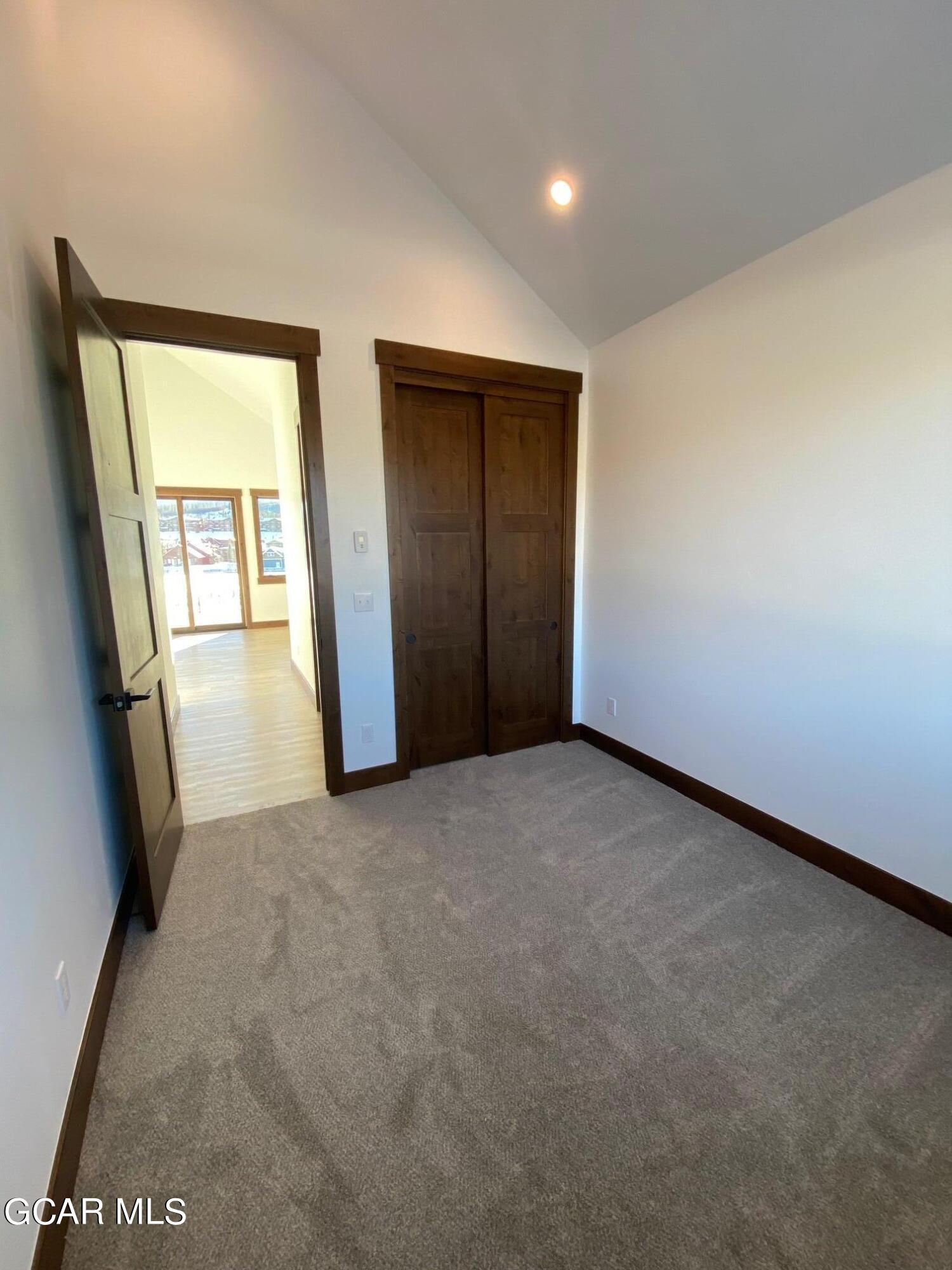 168 Hay Meadow Drive Fraser, CO 80442 - Photo 16 of 35 an empty room with windows