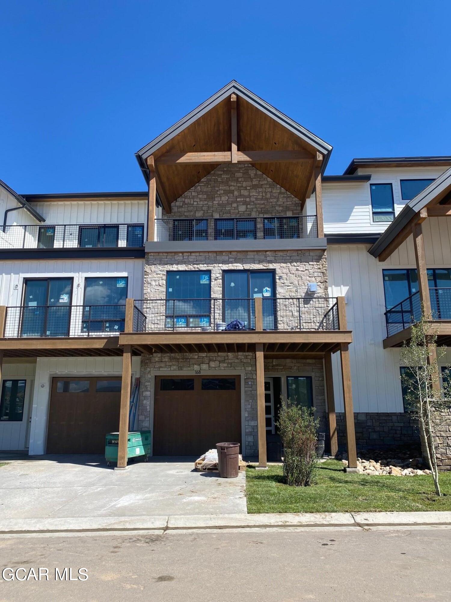 168 Hay Meadow Drive Fraser, CO 80442 - Photo 2 of 35 a front view of building with yard