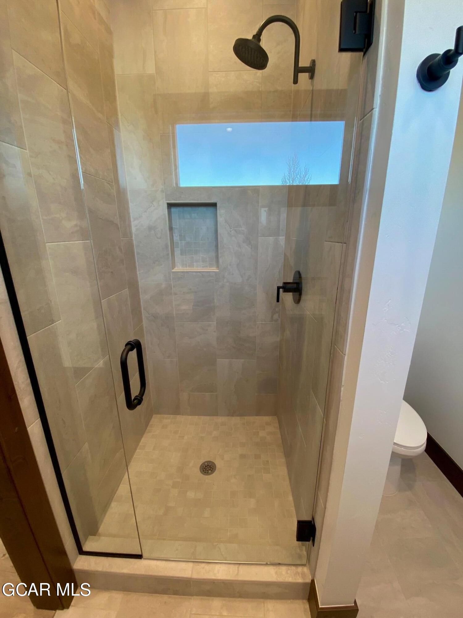 168 Hay Meadow Drive Fraser, CO 80442 - Photo 30 of 35 a bathroom with a shower