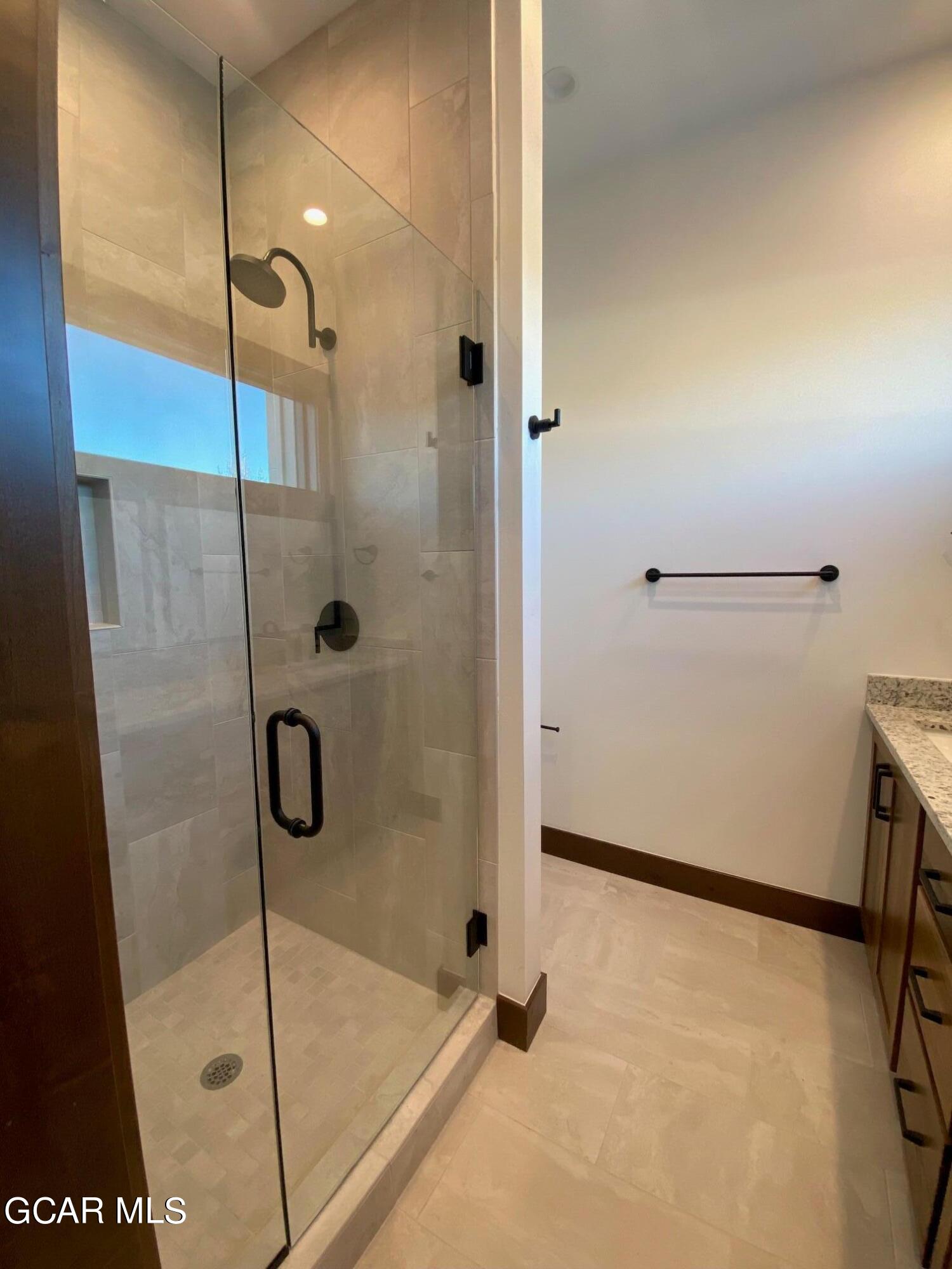 168 Hay Meadow Drive Fraser, CO 80442 - Photo 32 of 35 a bathroom with a shower