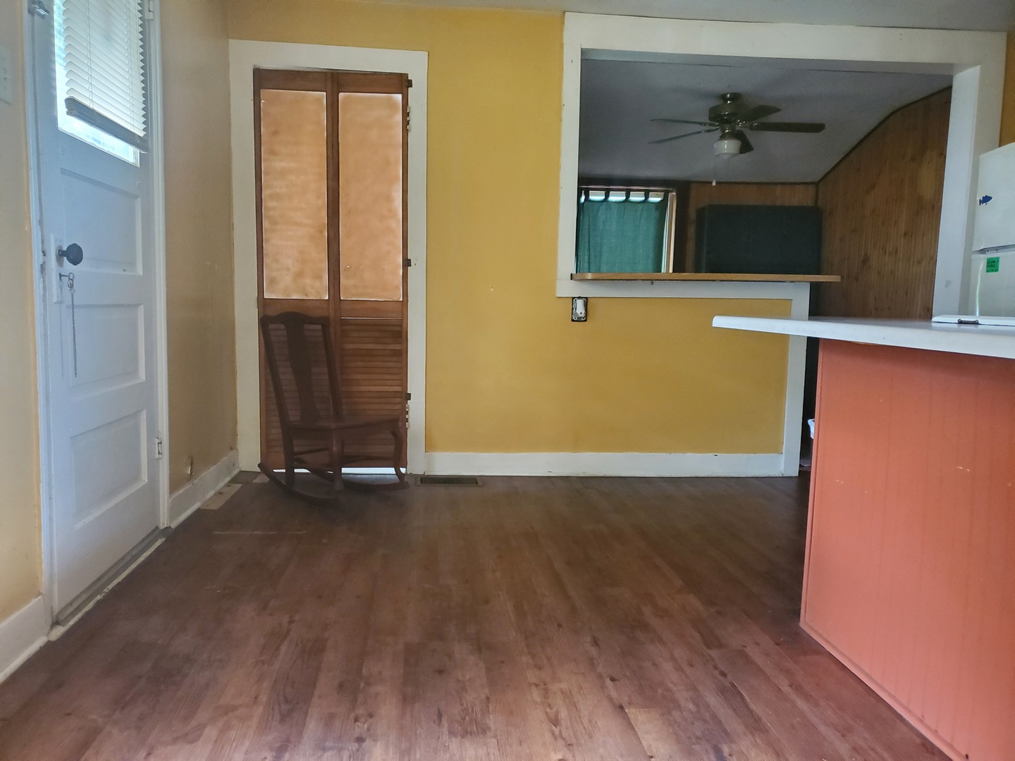 322 North Peoria Street Gilman, IL 60938 - Photo 13 of 15 an empty room with wooden floor and windows