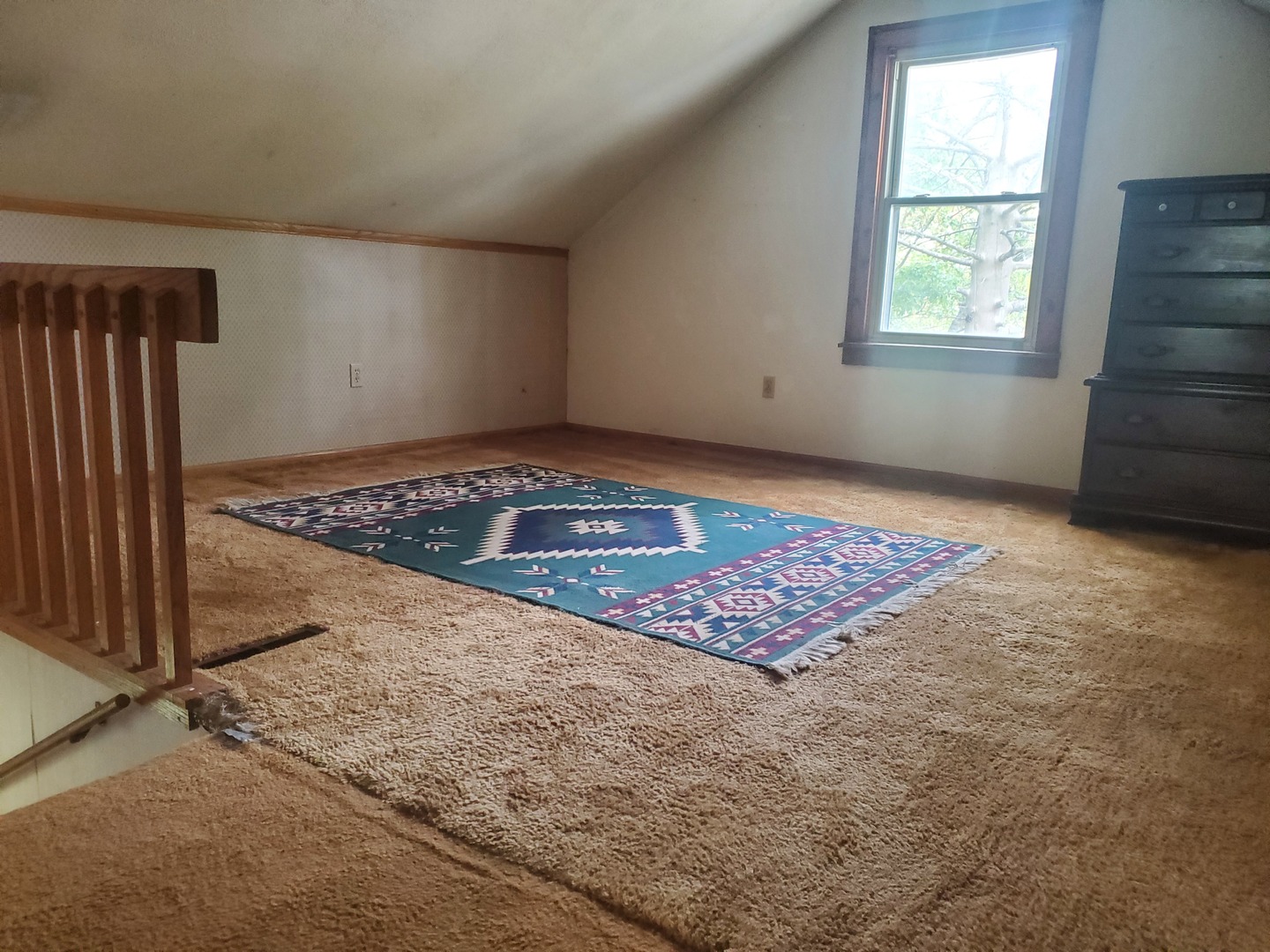 322 North Peoria Street Gilman, IL 60938 - Photo 9 of 15 a view of an empty room with window and wooden floor