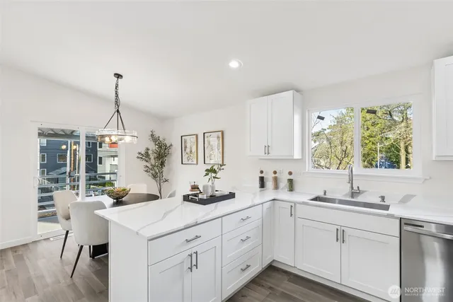 a view of a living room with furniture