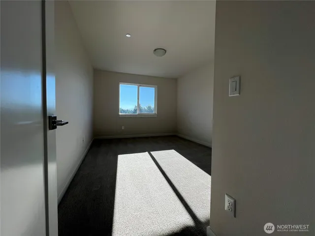 a view of hallway with a window