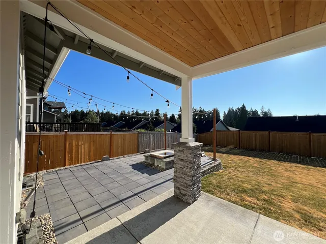a view of balcony with furniture