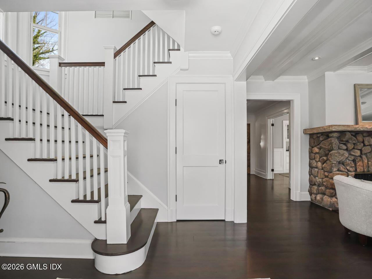 21 Lake Drive Riverside, CT 06878 - Photo 11 of 39 a view of entryway and hall with wooden floor