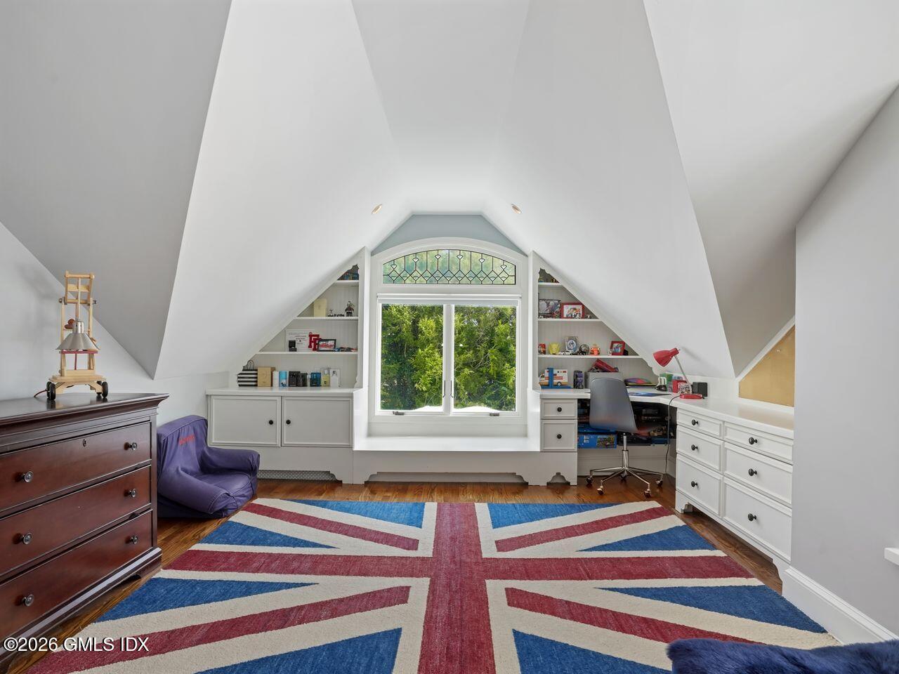 21 Lake Drive Riverside, CT 06878 - Photo 19 of 39 a living room with furniture and paintings on the wall