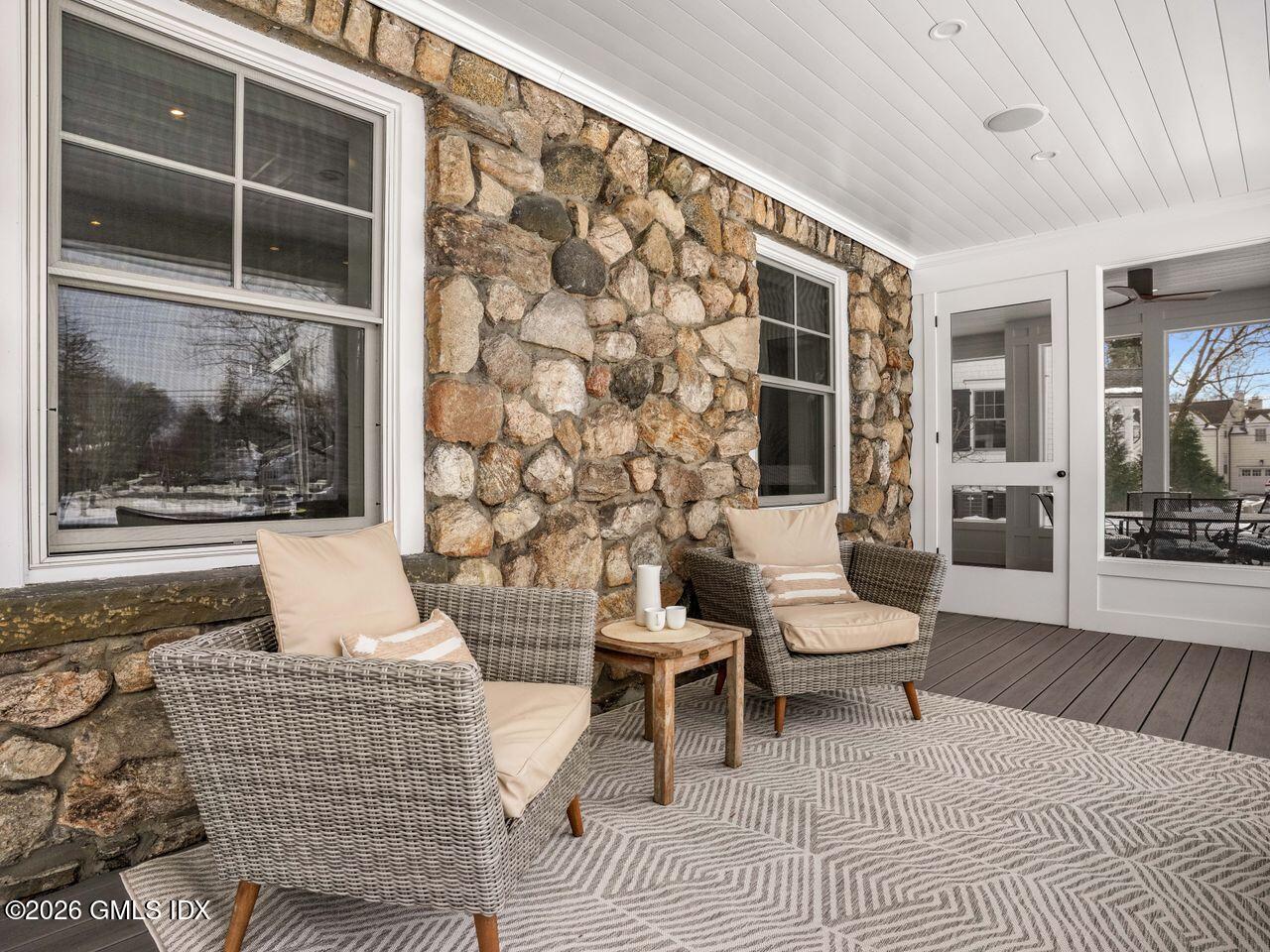 21 Lake Drive Riverside, CT 06878 - Photo 2 of 39 a living room with furniture and a window