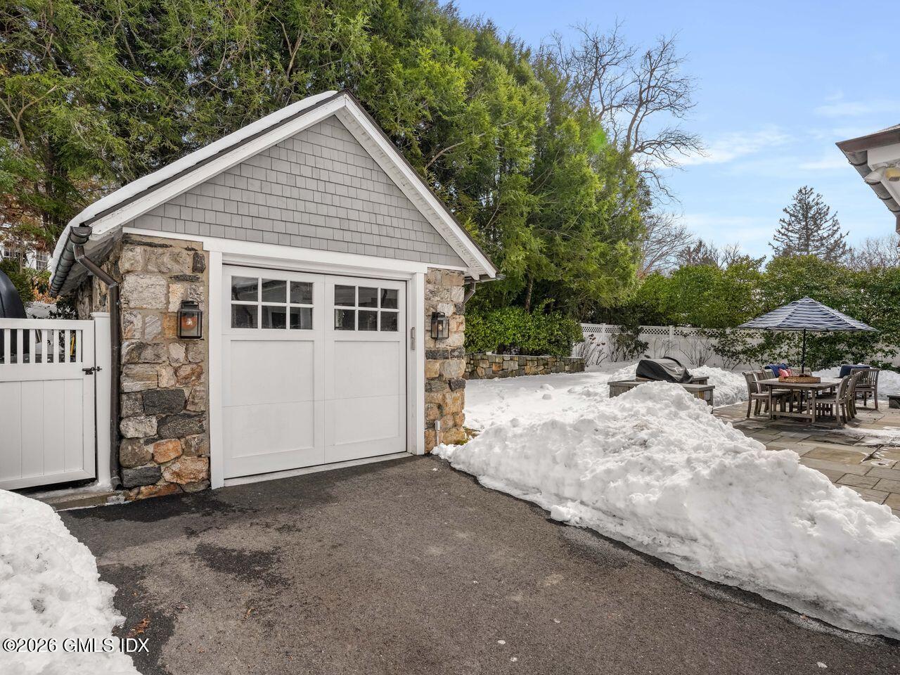 21 Lake Drive Riverside, CT 06878 - Photo 33 of 39 a view of a house with a patio