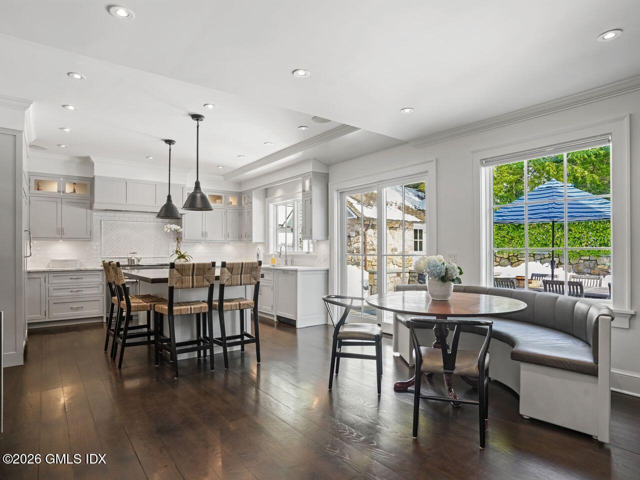 21 Lake Drive Riverside, CT 06878 - Photo 8 of 39 a dining room with furniture window and wooden floor