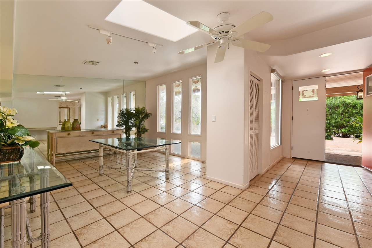 166 Halelo Street Lahaina, HI 96761 - Photo 11 of 27 a view of a living room and chandelier fan
