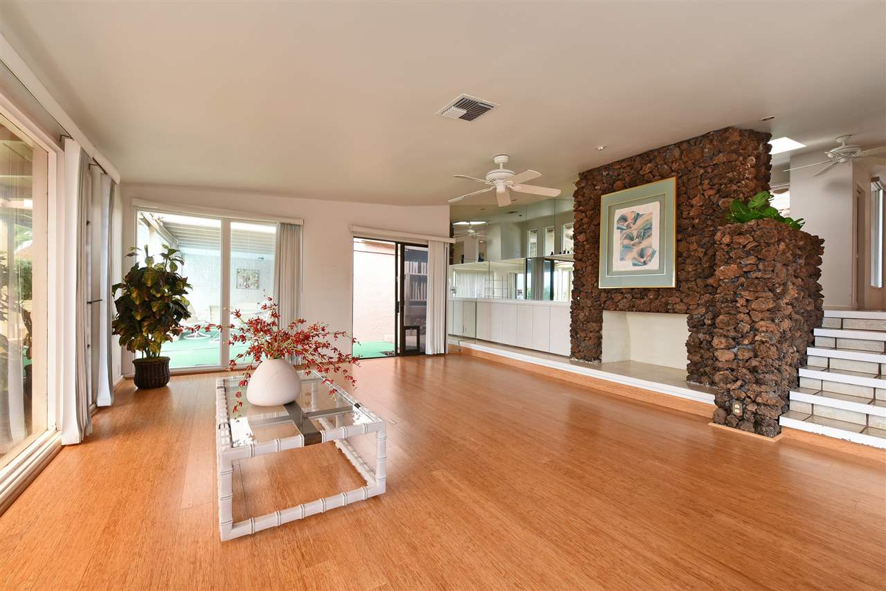 166 Halelo Street Lahaina, HI 96761 - Photo 6 of 27 a living room with furniture and a large window