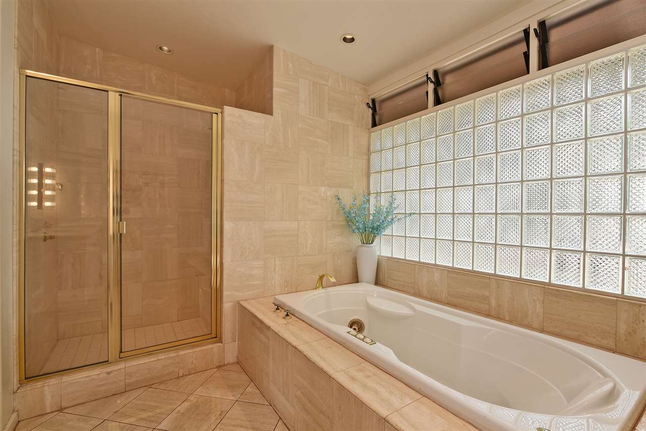 166 Halelo Street Lahaina, HI 96761 - Photo 8 of 27 a bathroom with a bathtub and shower