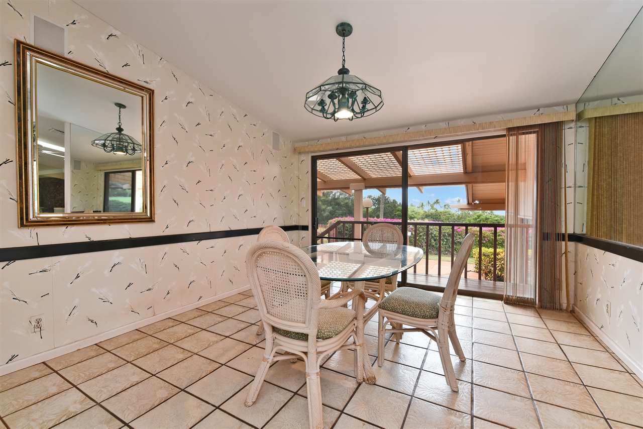 166 Halelo Street Lahaina, HI 96761 - Photo 10 of 27 a view of an outdoor dining space with furniture