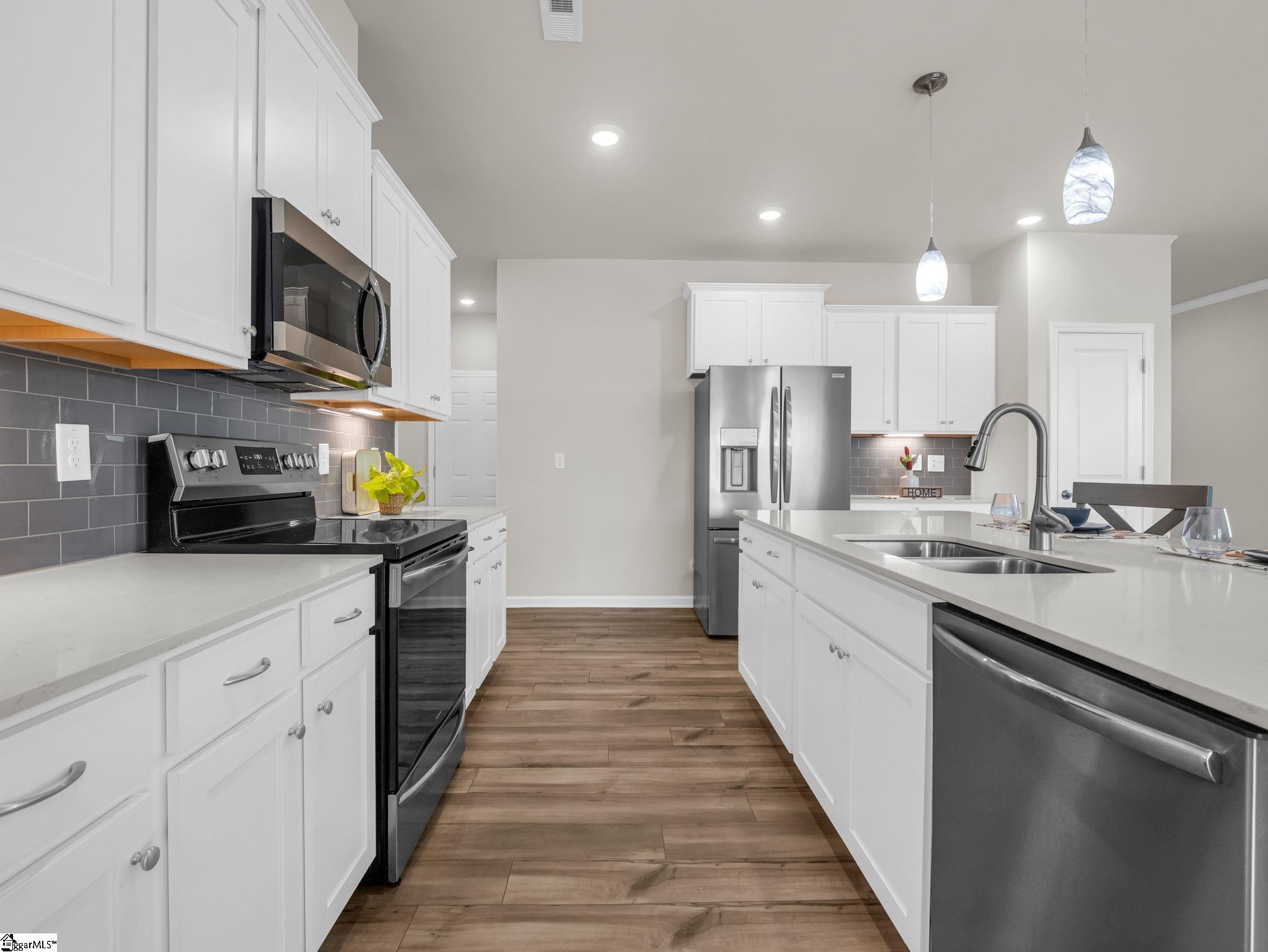 566 New Cut Meadows Road Inman, SC 29349 - Photo 10 of 35 Imagine creating all your favorite dishes in your new home. Tons of counter space for serving too!