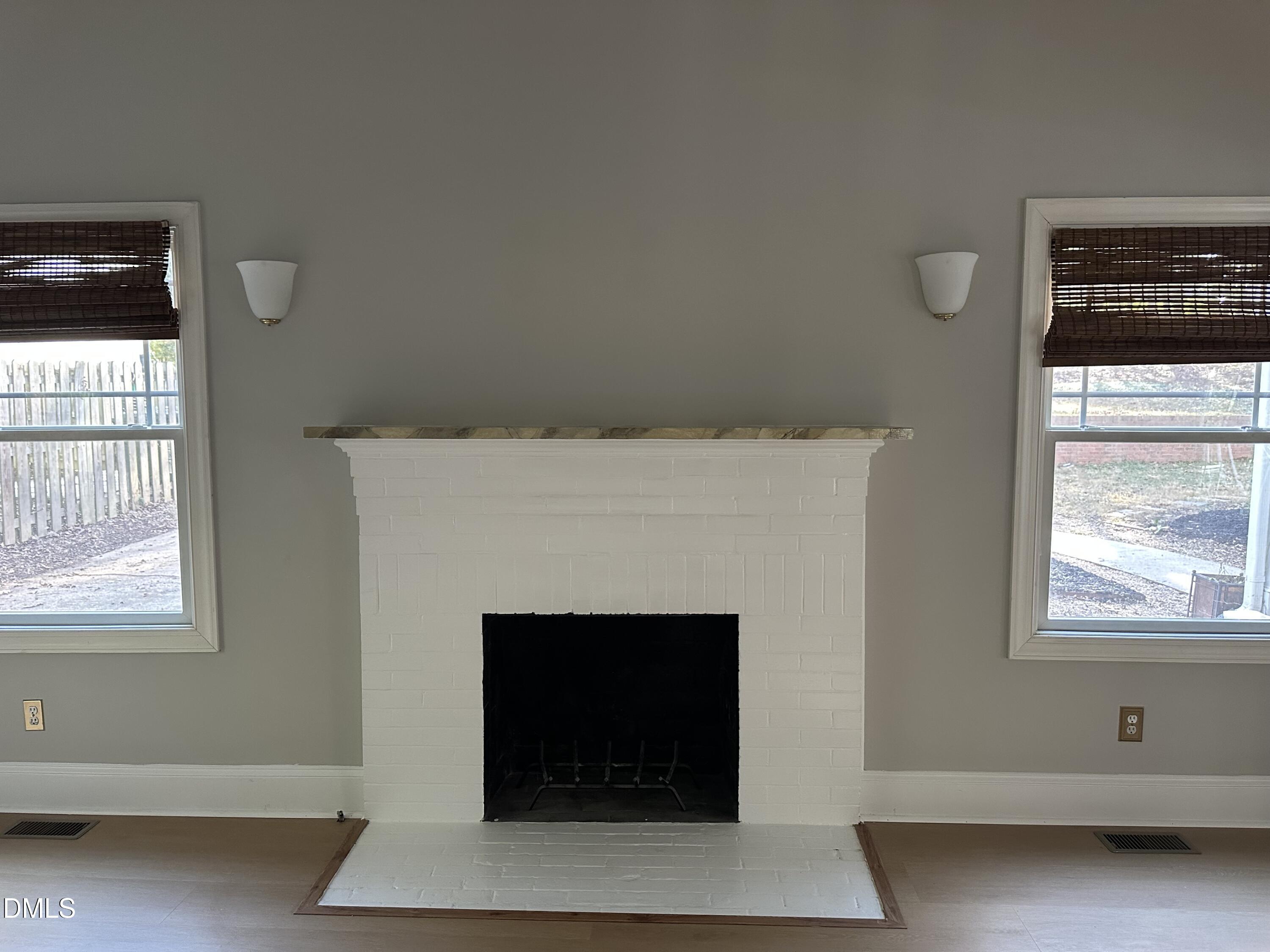 2610 Dover Road Raleigh, NC 27608 - Photo 11 of 53 a living room with furniture and a fireplace