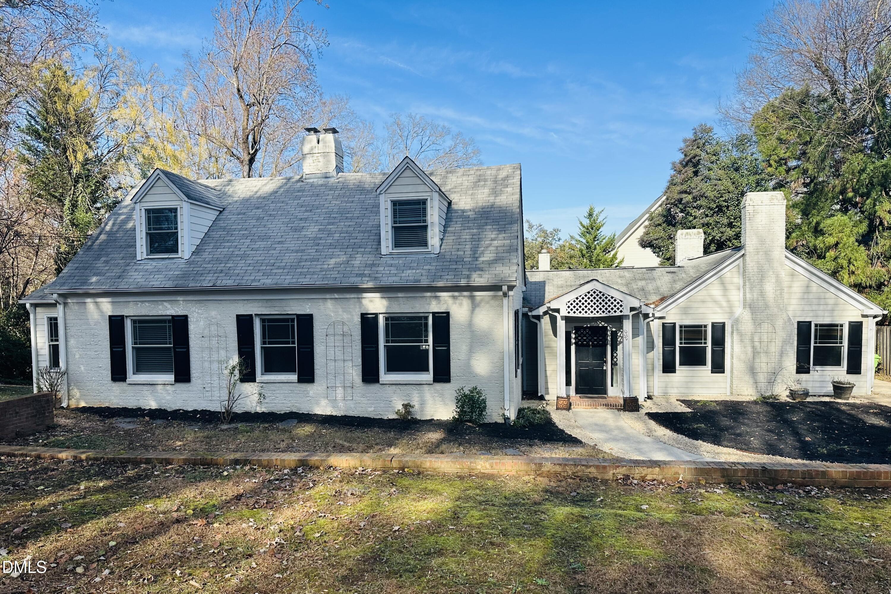 2610 Dover Road Raleigh, NC 27608 - Photo 2 of 53 a front view of a house with a yard