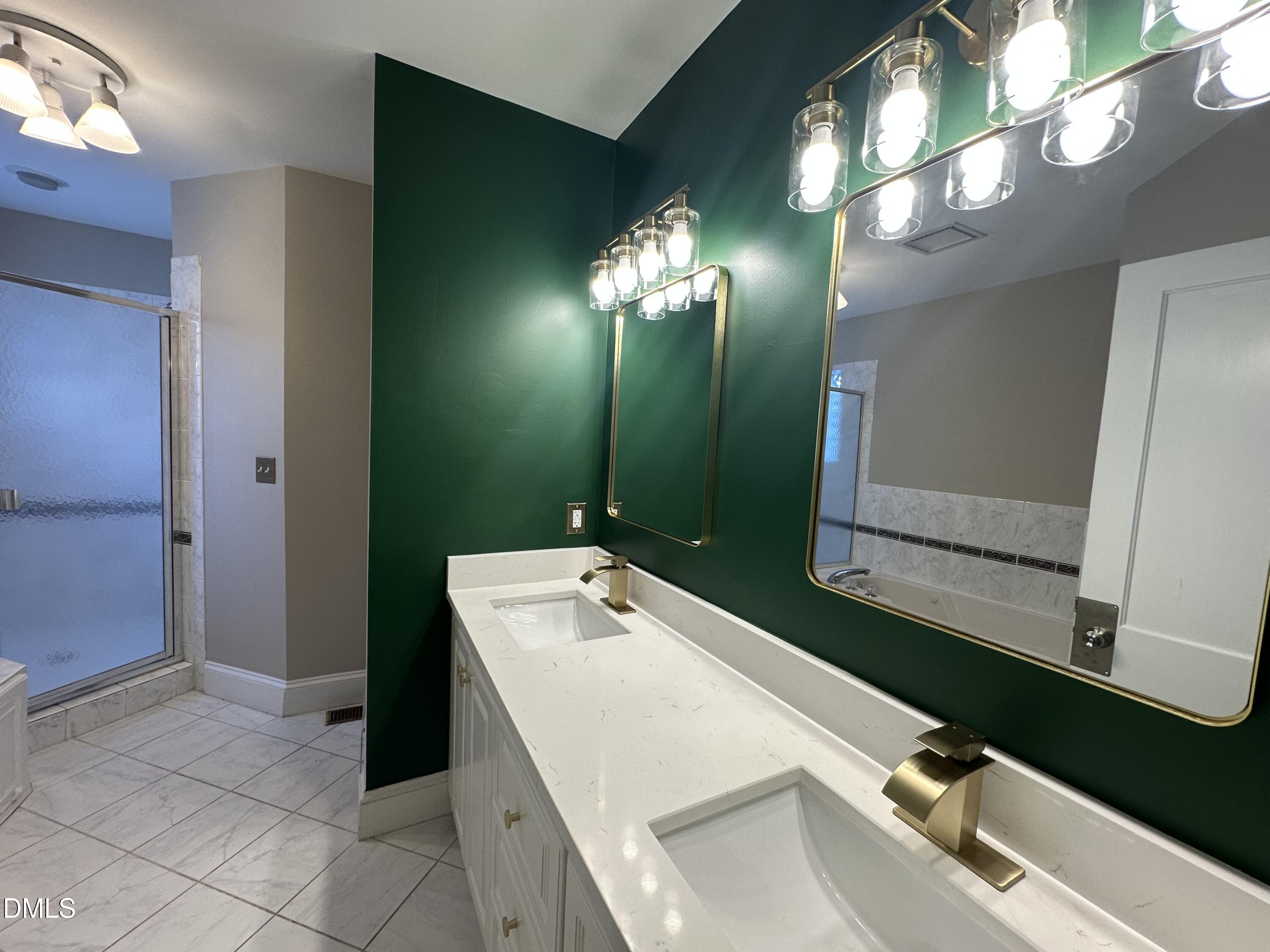 2610 Dover Road Raleigh, NC 27608 - Photo 30 of 53 a bathroom with a sink and a mirror