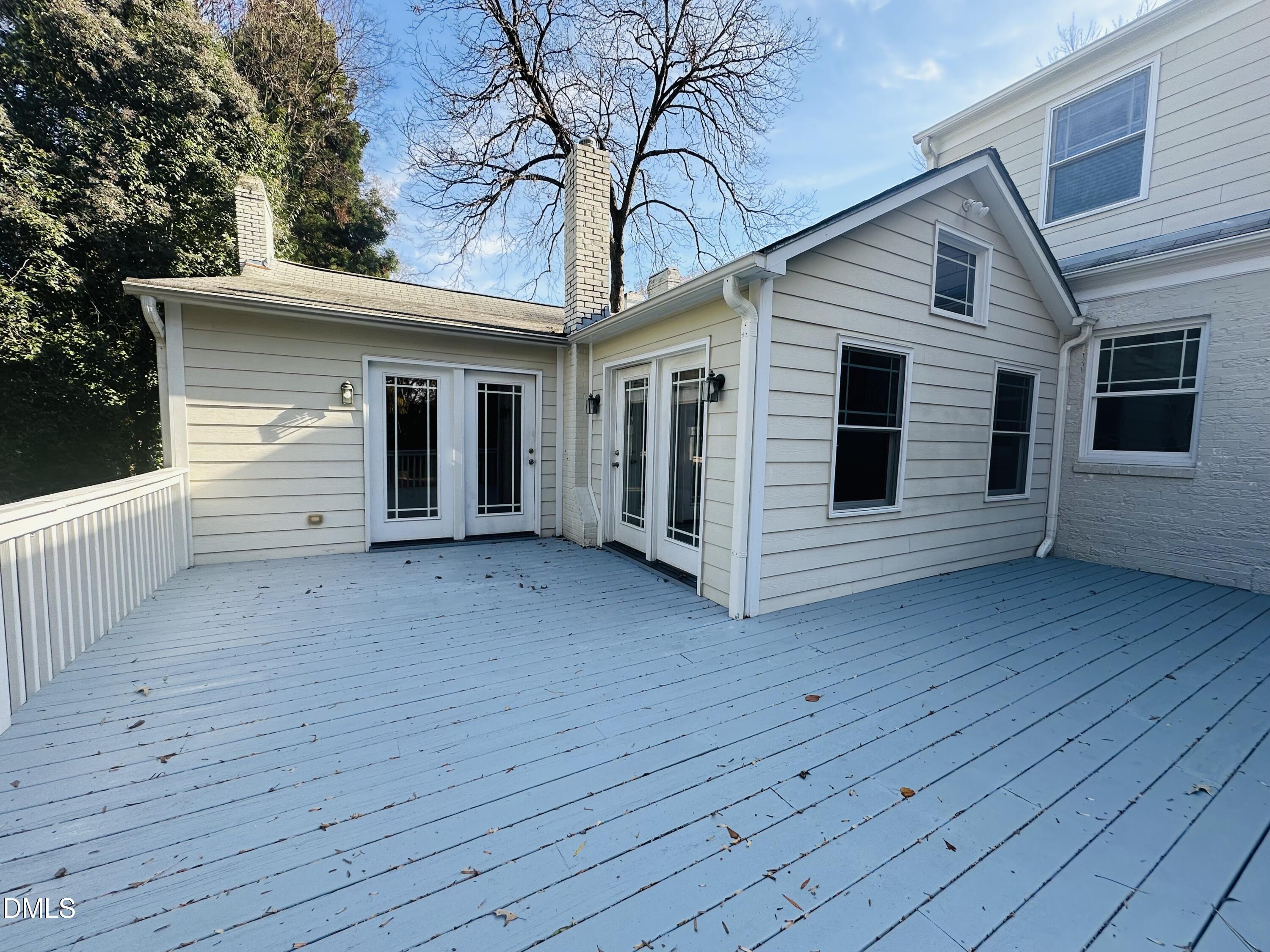 2610 Dover Road Raleigh, NC 27608 - Photo 46 of 53 a view of a house with a backyard