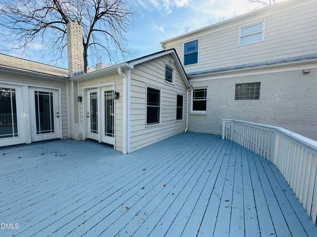 a view of a house with a roof deck