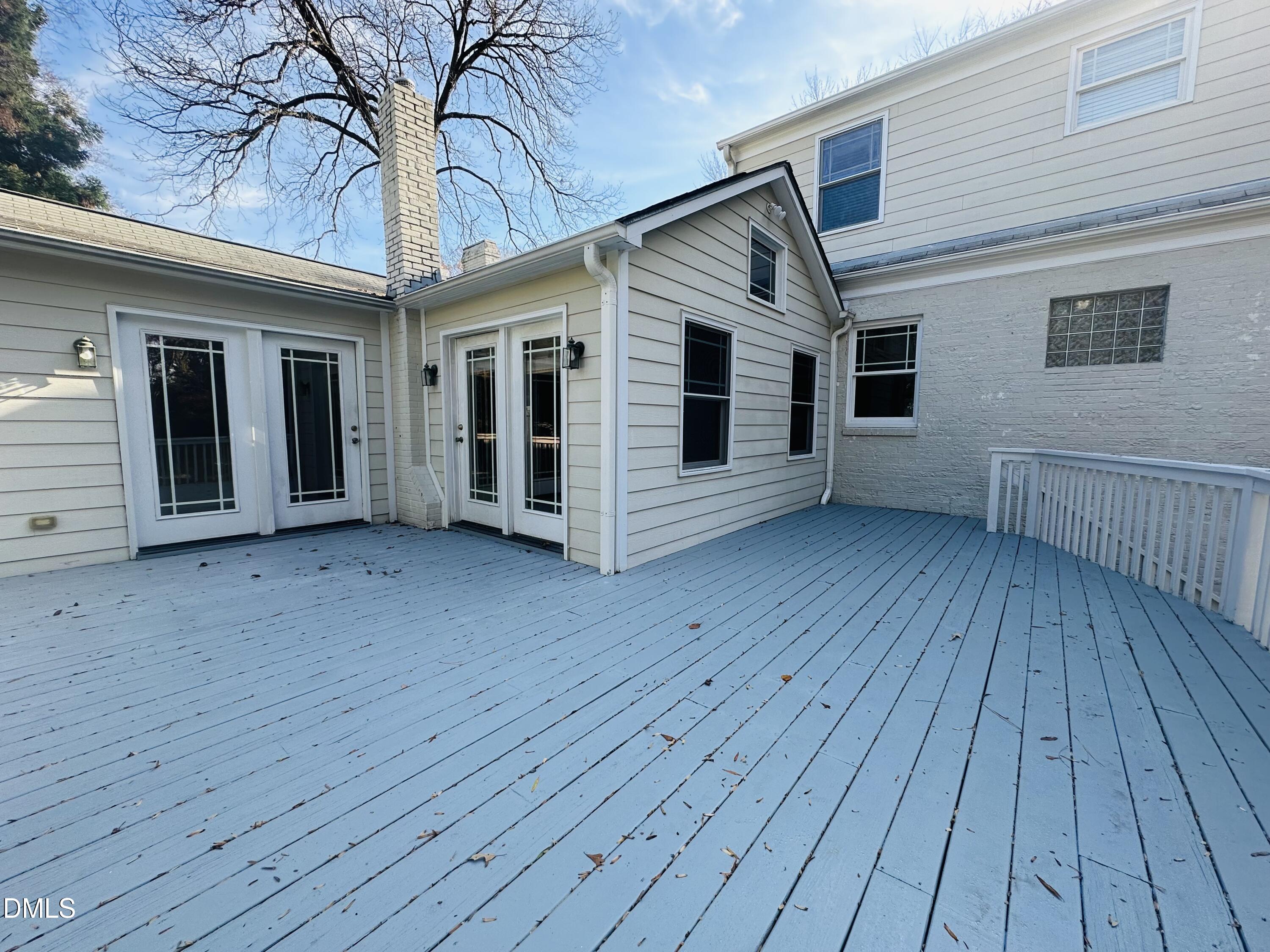 2610 Dover Road Raleigh, NC 27608 - Photo 49 of 53 a view of a house with wooden deck