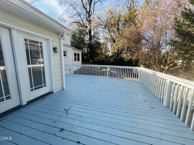 a view of a house with a roof deck
