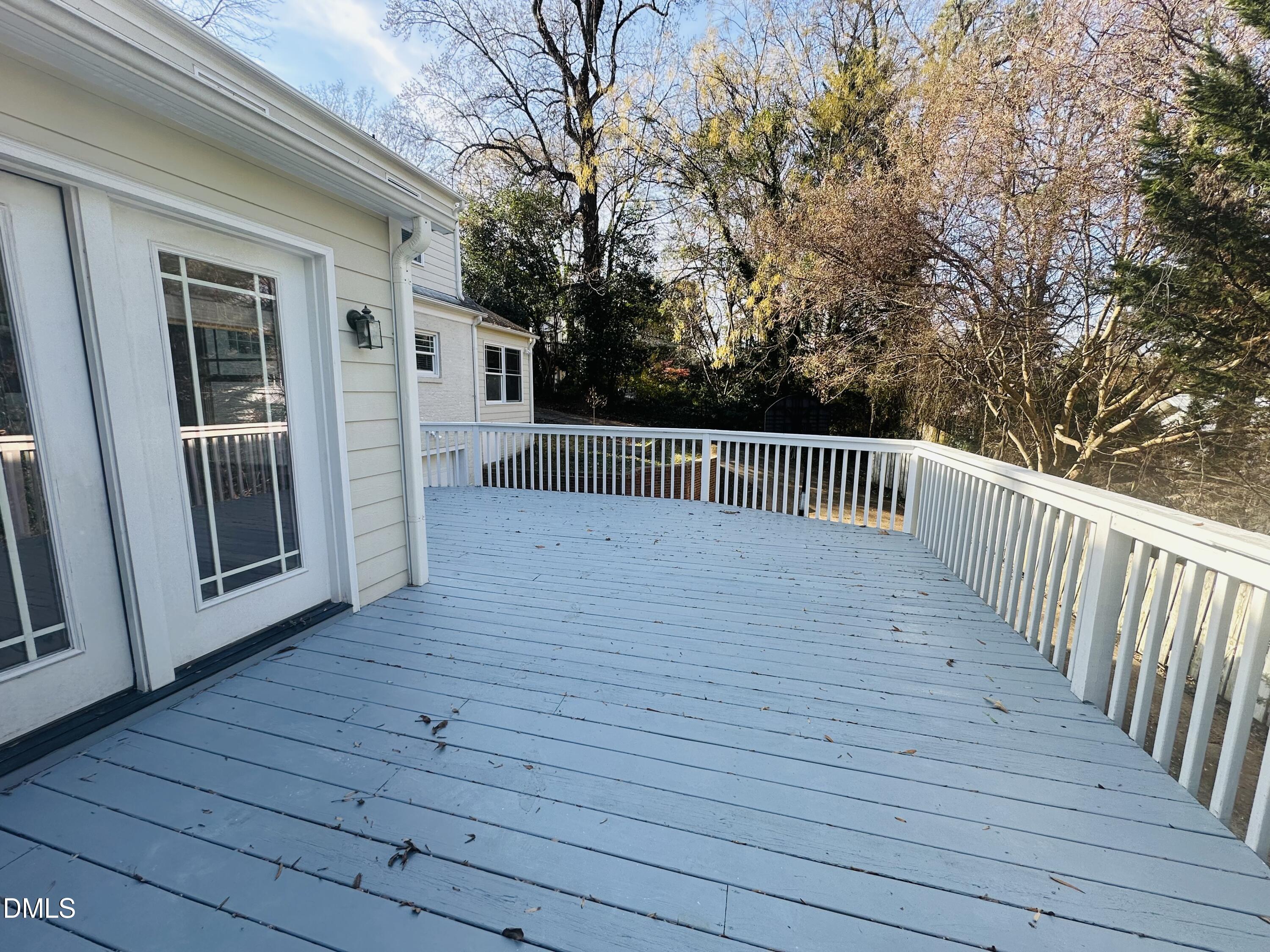 2610 Dover Road Raleigh, NC 27608 - Photo 50 of 53 a view of backyard with deck and wooden floor