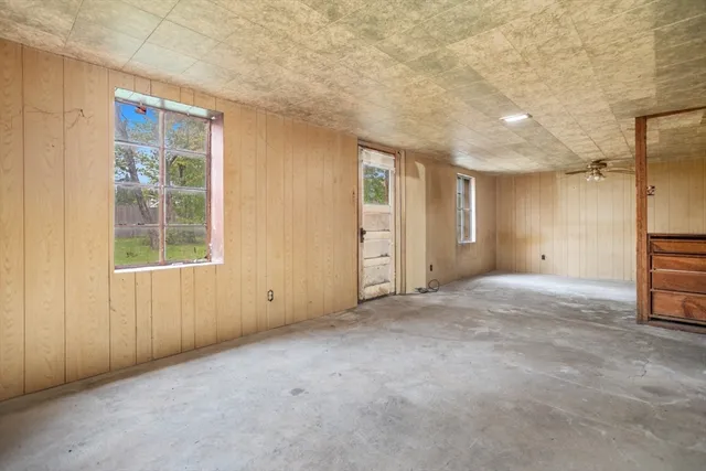 an empty room with windows