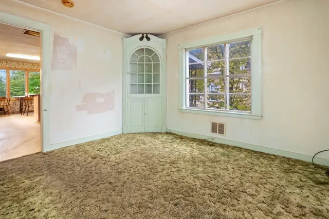 a kitchen with sink cabinets and window