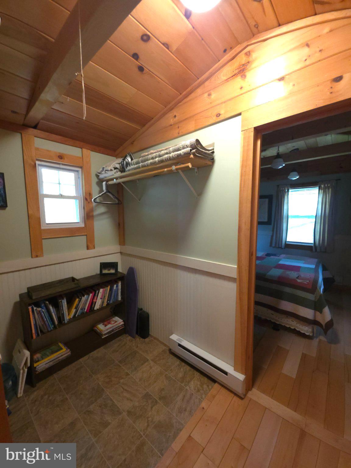 152 Sharp Ridge Lane Franklin, WV 26807 - Photo 21 of 53 a view of an empty room with a fireplace