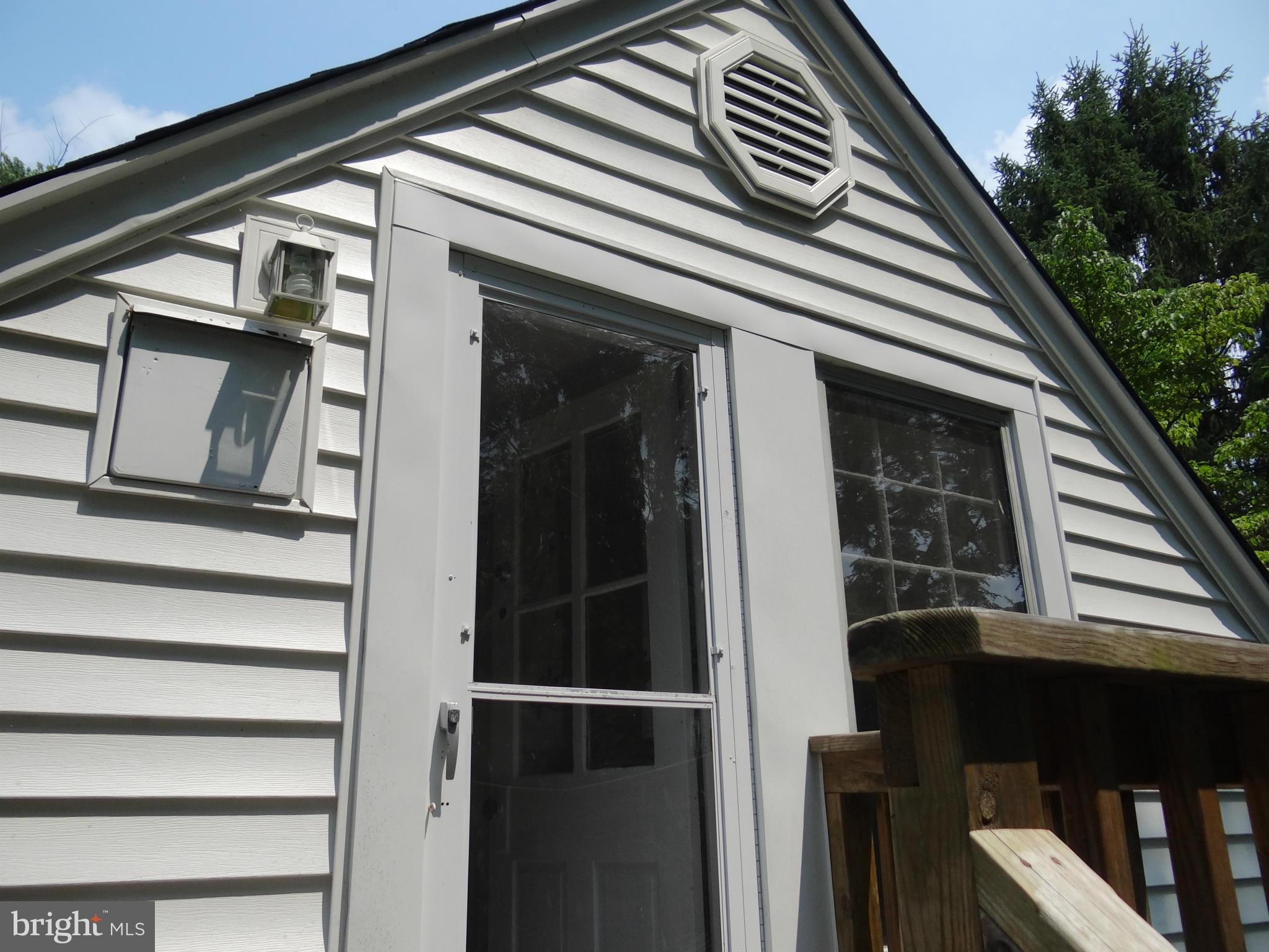 2902 Ridge Road Baltimore, MD 21244 - Photo 13 of 23 a view of front door and deck