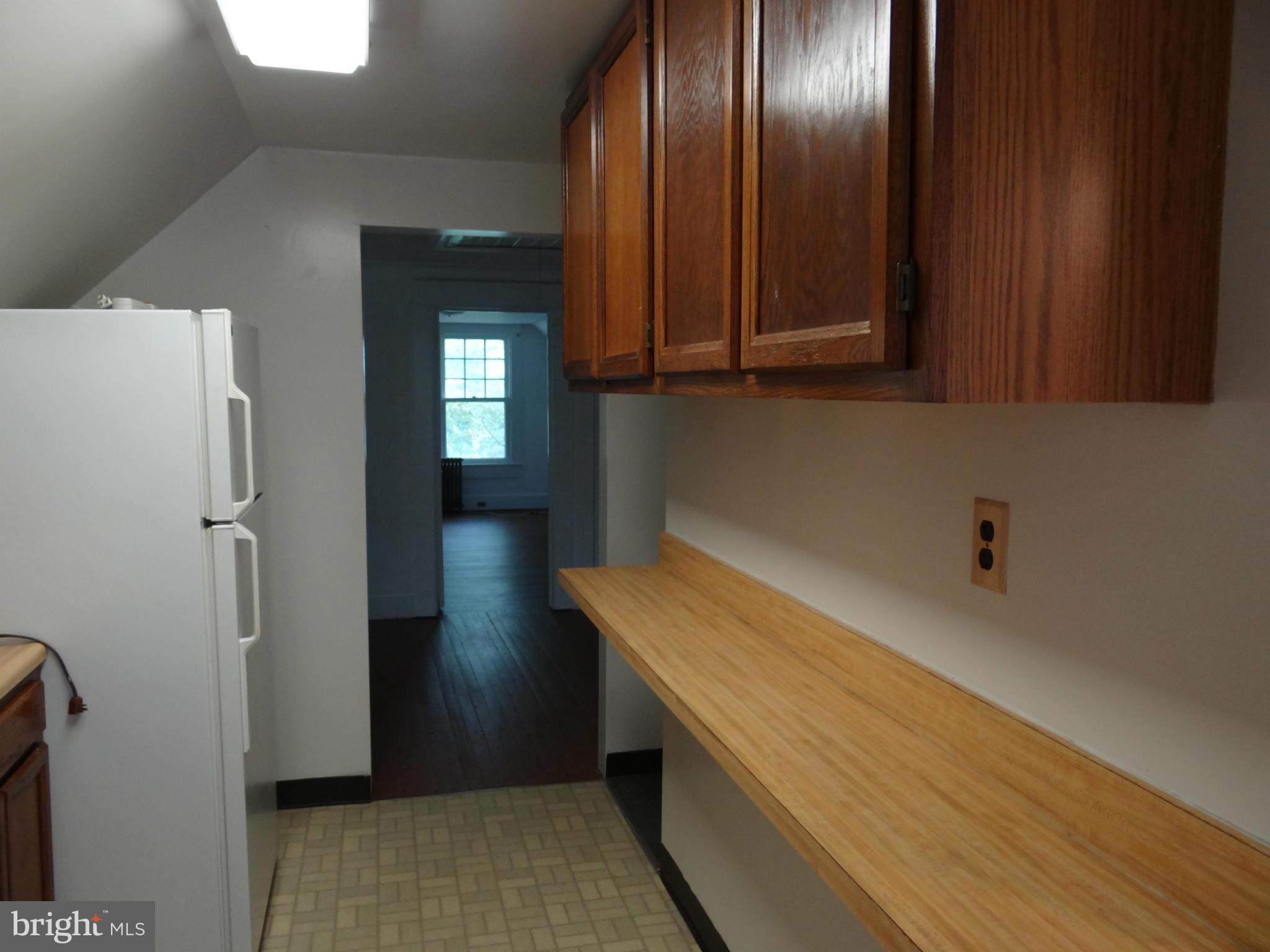 2902 Ridge Road Baltimore, MD 21244 - Photo 5 of 23 a room with storage and utility