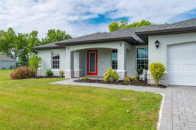 a view of a house with a patio