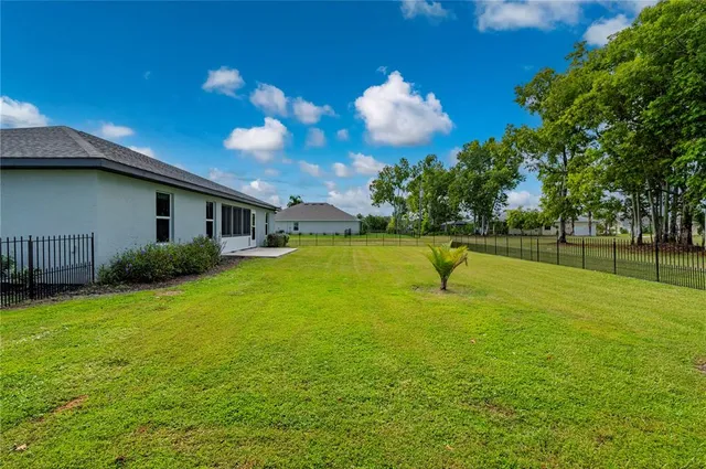 a view of a house with a swimming pool