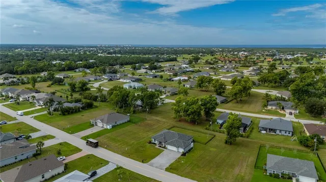 an aerial view of a city with lots of residential buildings