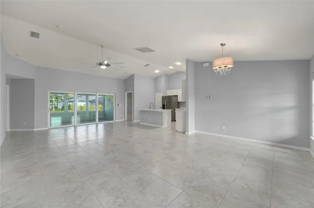 a view of an empty room with a stove