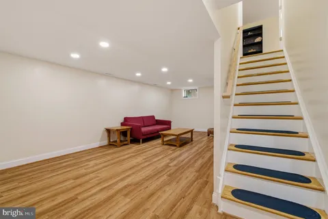 a living room with a wooden floor