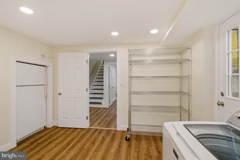 a room with a chair and a wooden floor