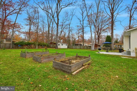 a view of outdoor space yard deck patio and outdoor kitchen